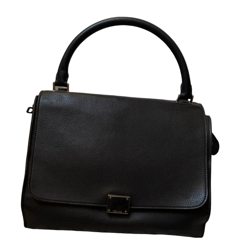 Black handbag on a white background