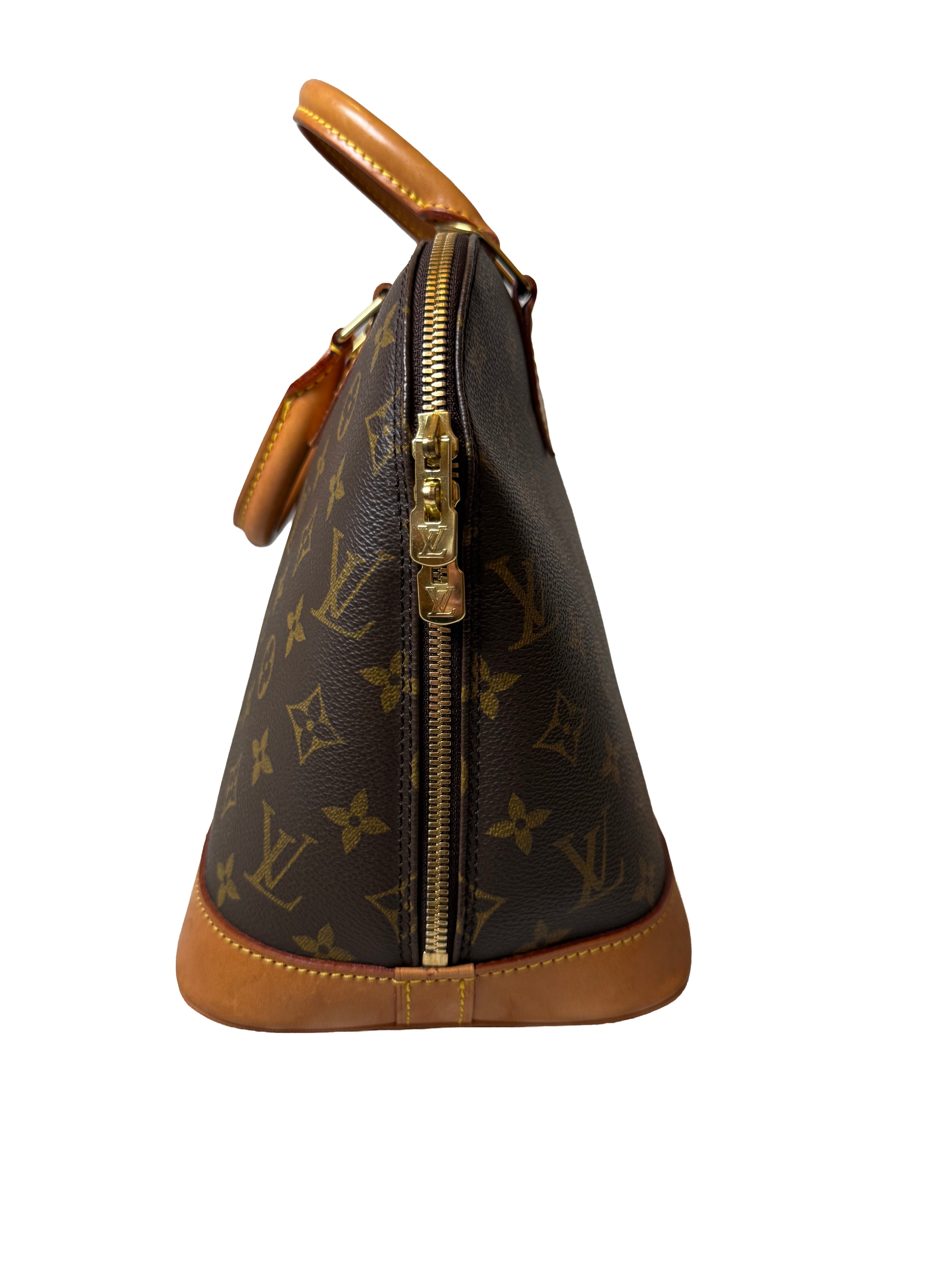 Louis Vuitton Alma Pm Handbag In The Iconic Monogram Canvas