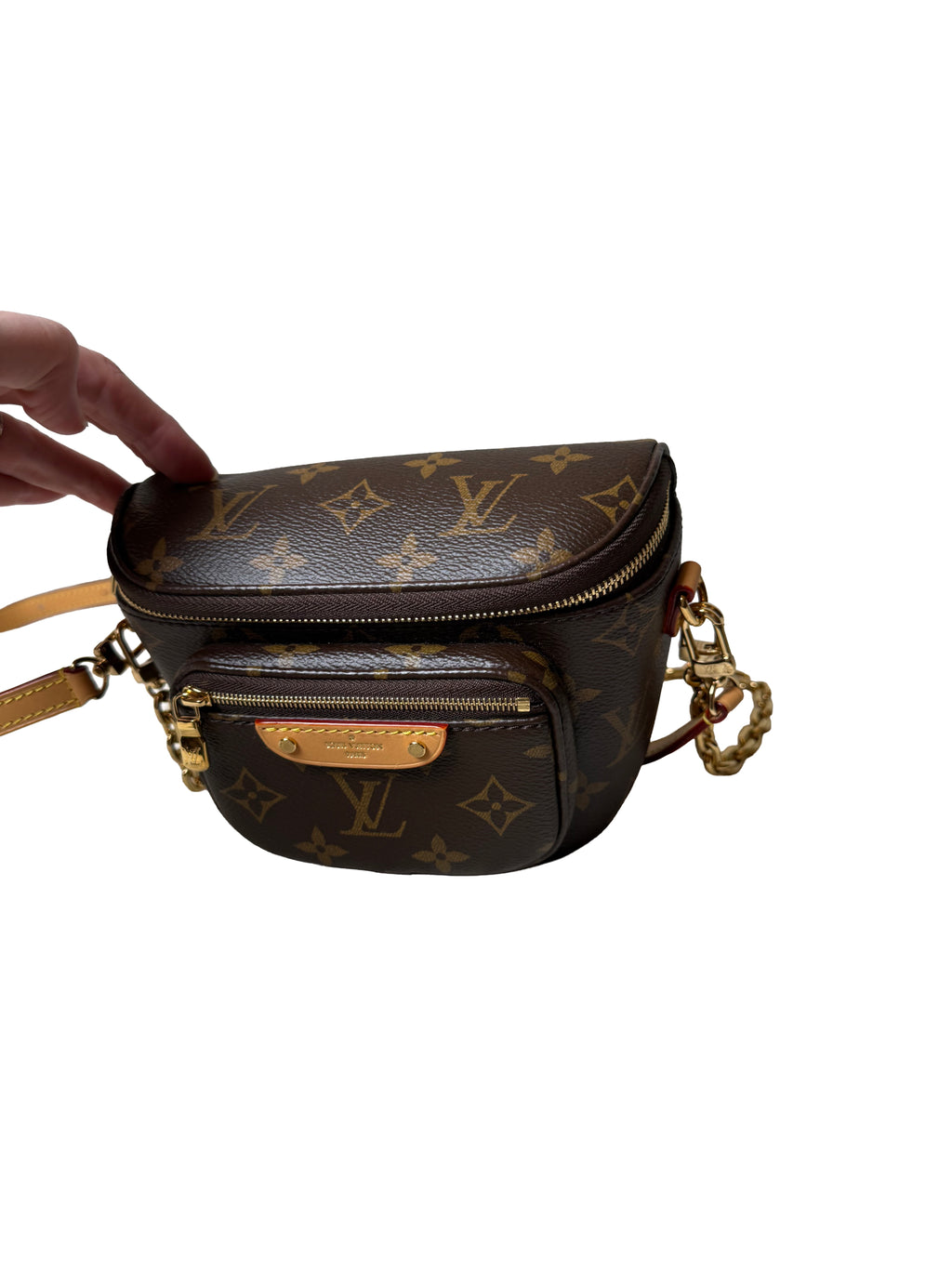 Louis Vuitton Mini Bumbag Is A Compact Belt Bag Crafted From Monogram Canvas With Natural Cowhide Leather Trim