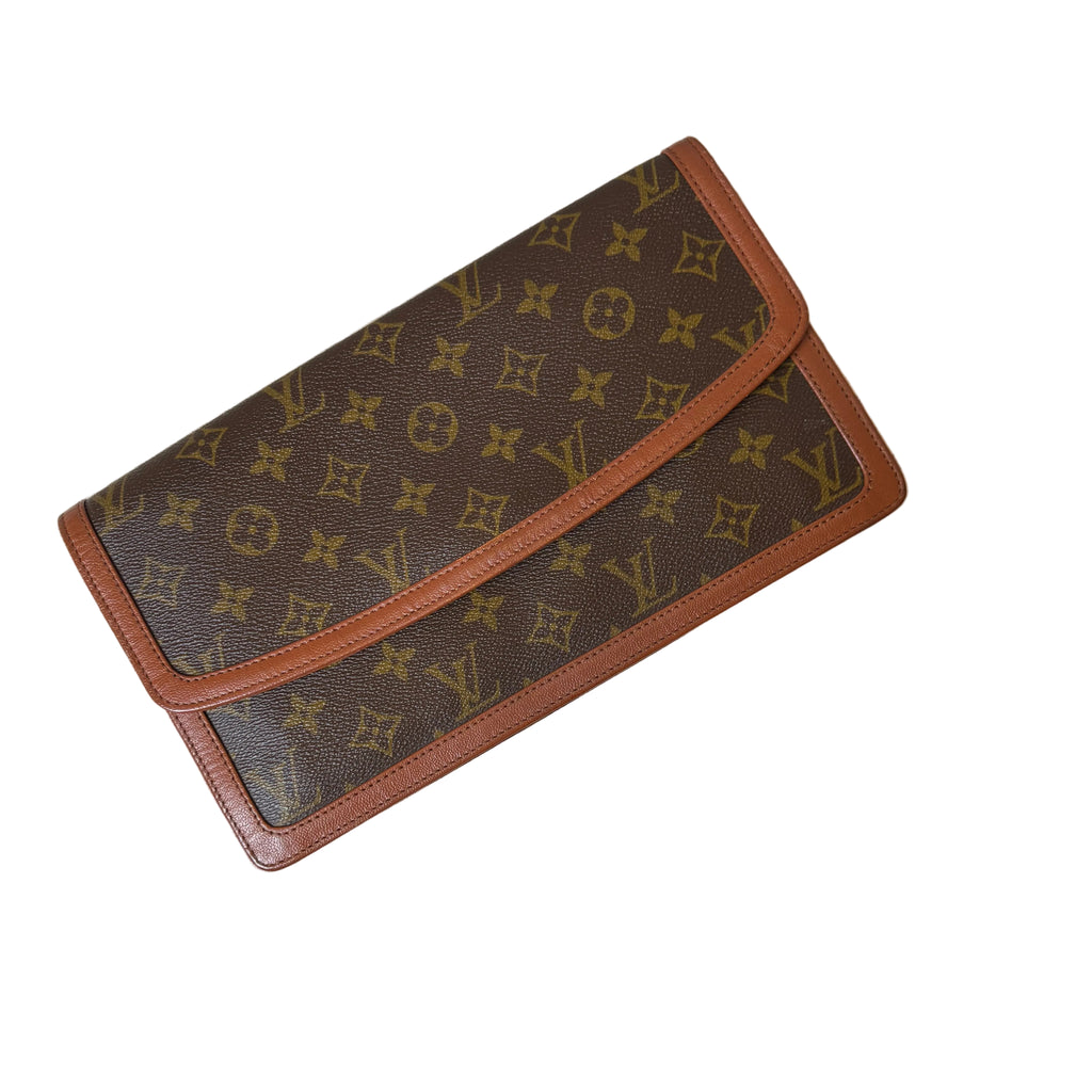 Designer wallet with monogram pattern on a white background